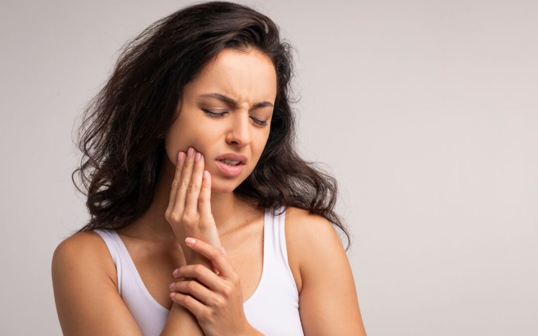 Patient experiencing emergency toothache due to dental abscess infection